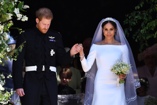 Prince Harry, Duke of Sussex, and his wife, Meghan, Duchess of Sussex, leave from the West Door of St. George’s Chapel, Windsor Castle, on May 19, 2018, in Windsor, England.
